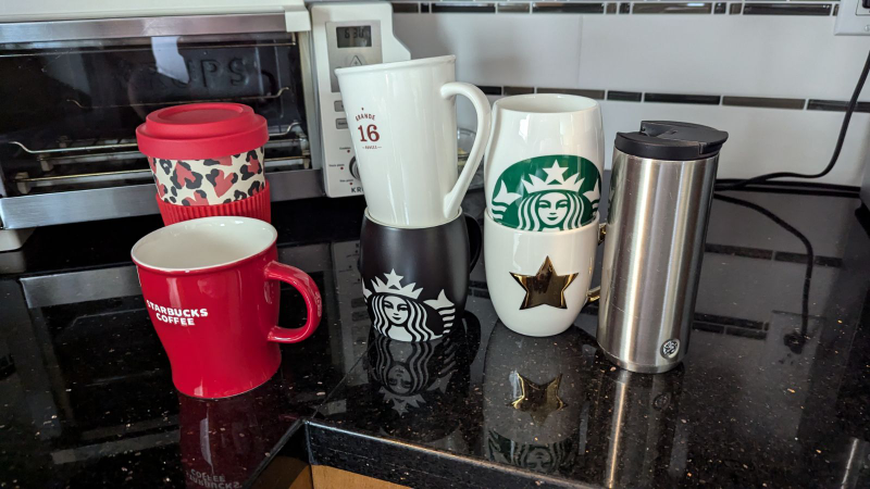 4 Starbucks mugs and 2 travelling cups - photo 3