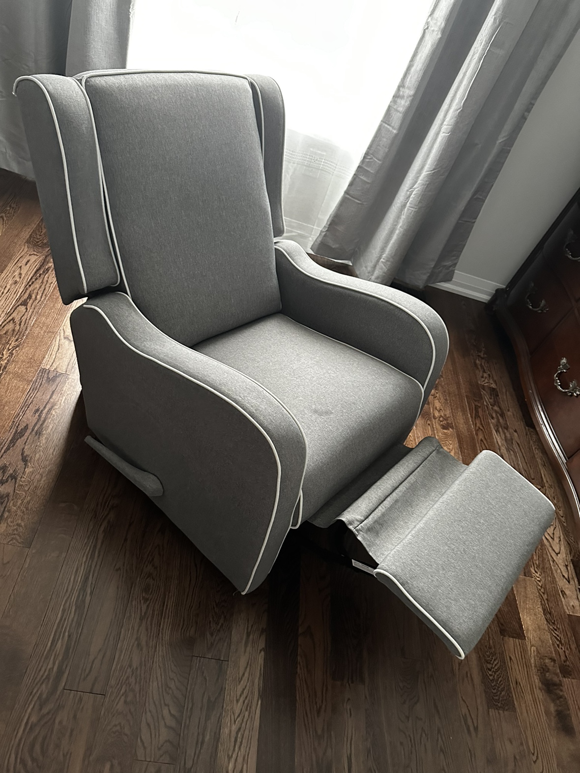 Nursing chair that reclines and rocks
