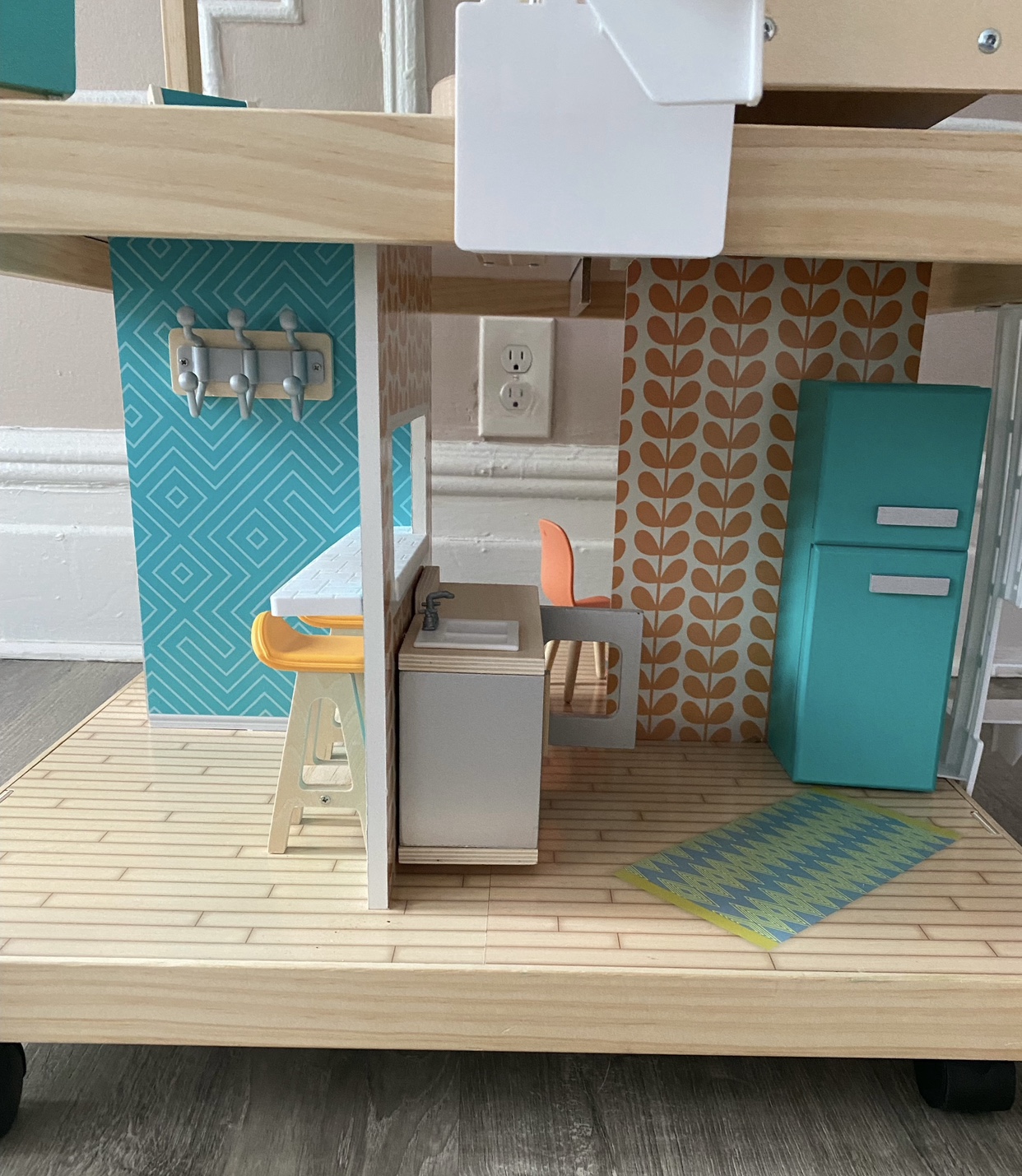 KidKraft Stylish Mansion Wooden Dollhouse with Wheeled B image indicator(9)