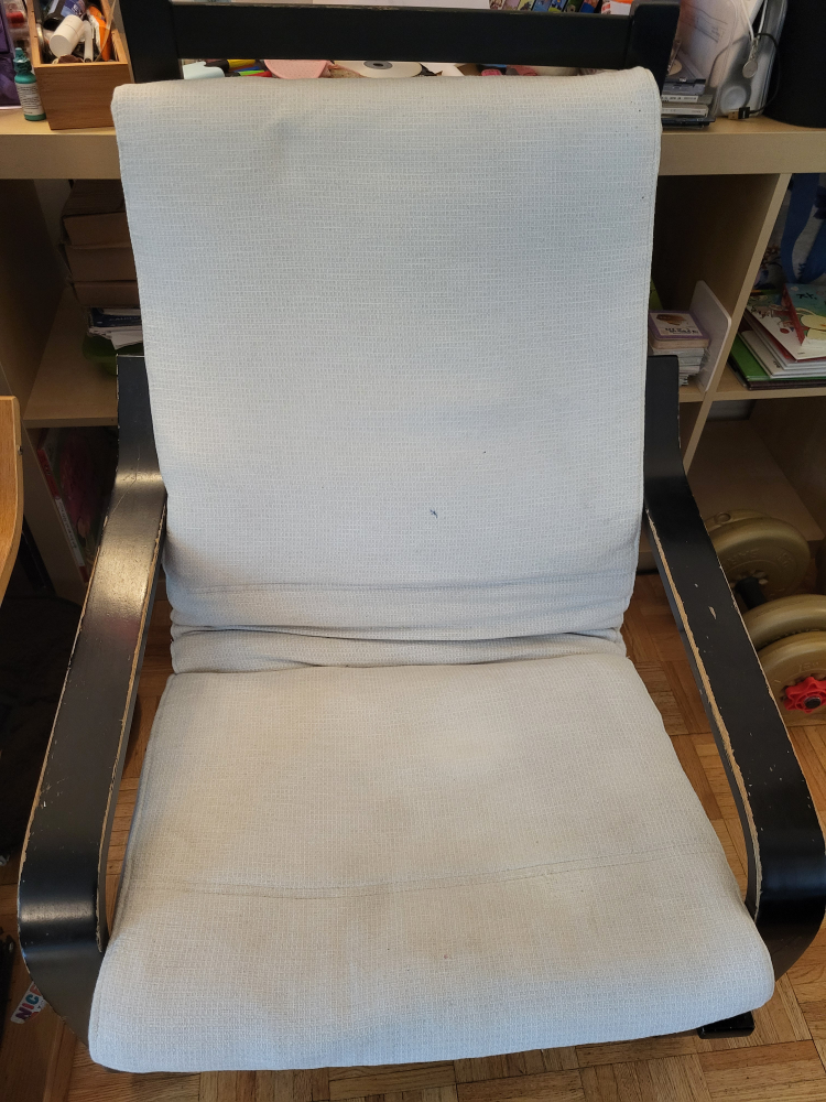 Ikea black armchair with white cushion thumbnail