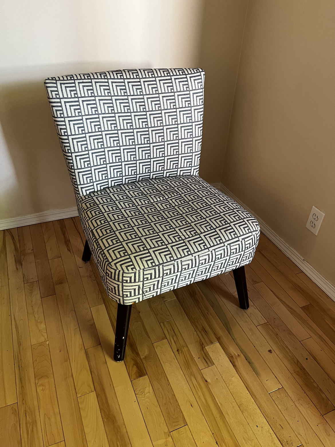 Blue and white upholstered chair