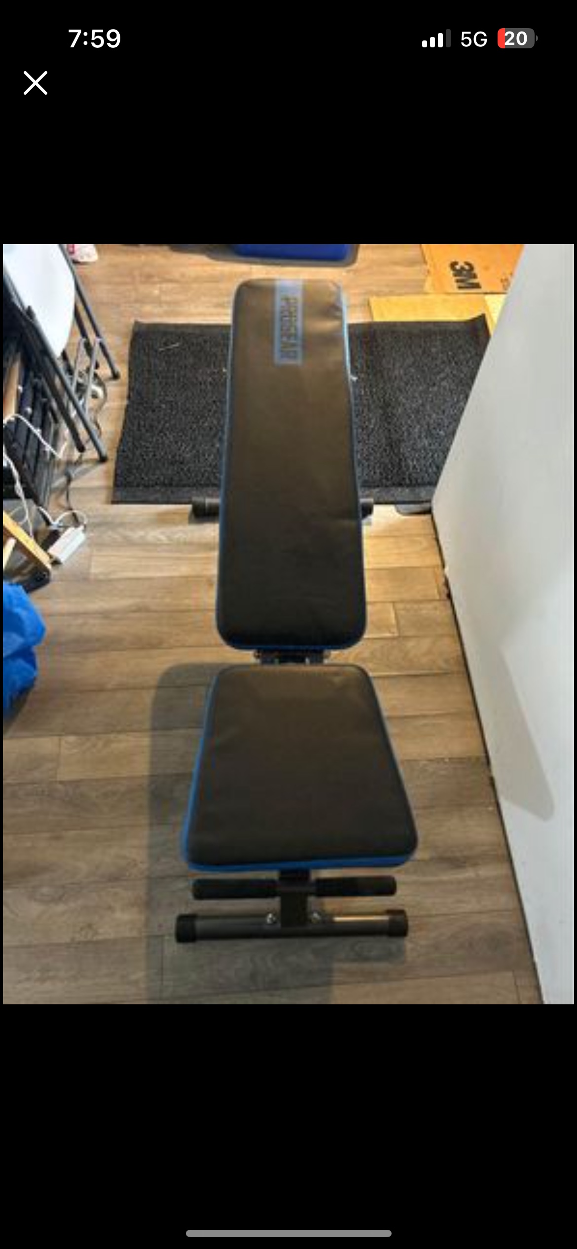 workout bench with weights and olympic bar