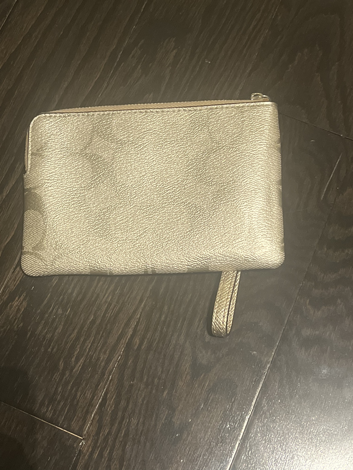 Coach metallic gold and silver wristlet image indicator(2)