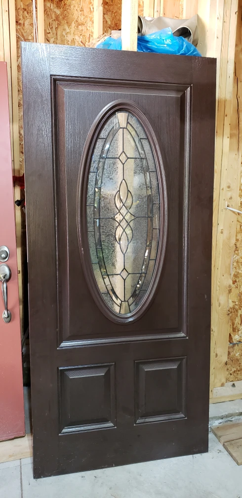 Fiberglass door with beautiful oval insert