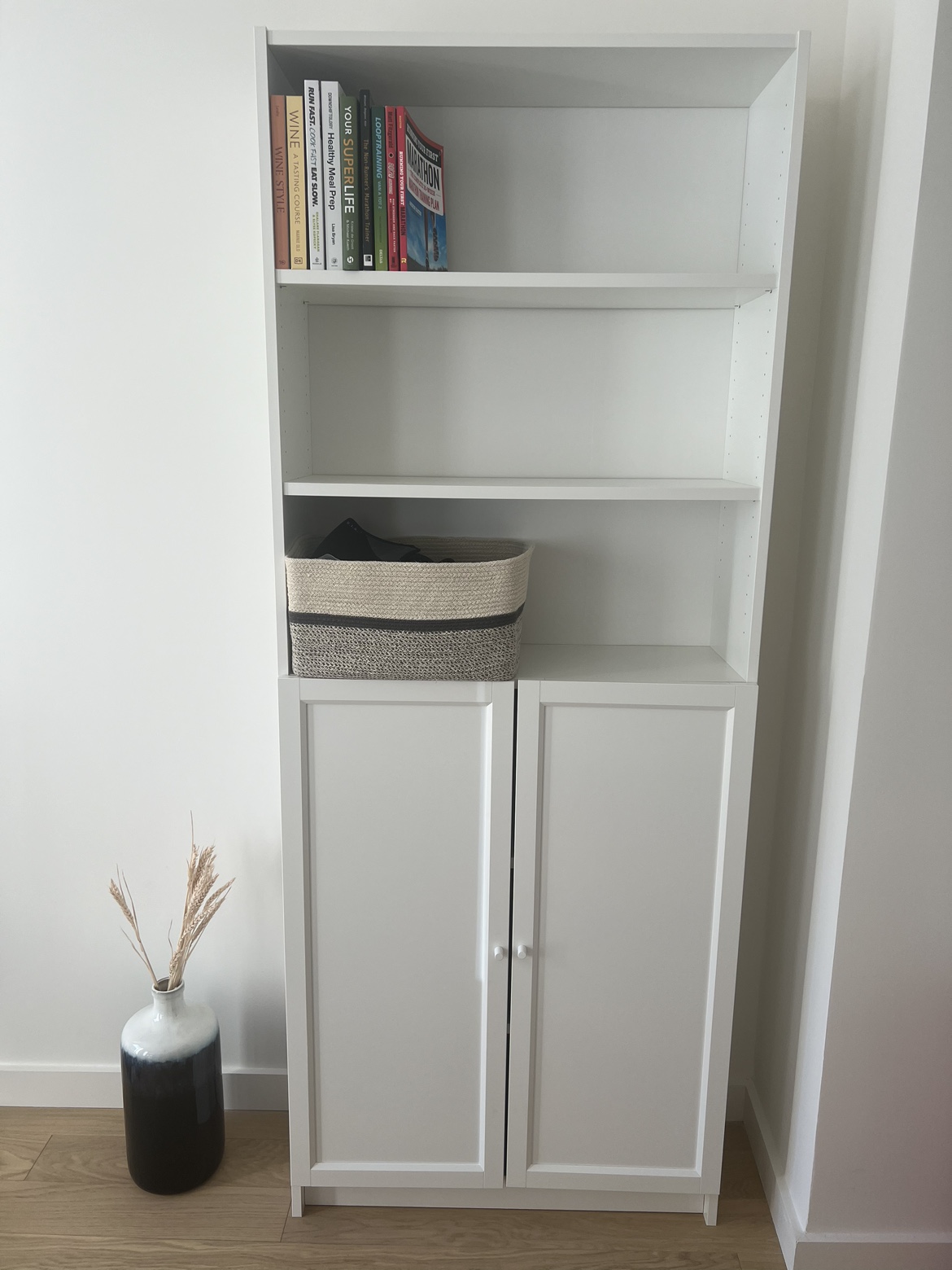 White bookcase with doors