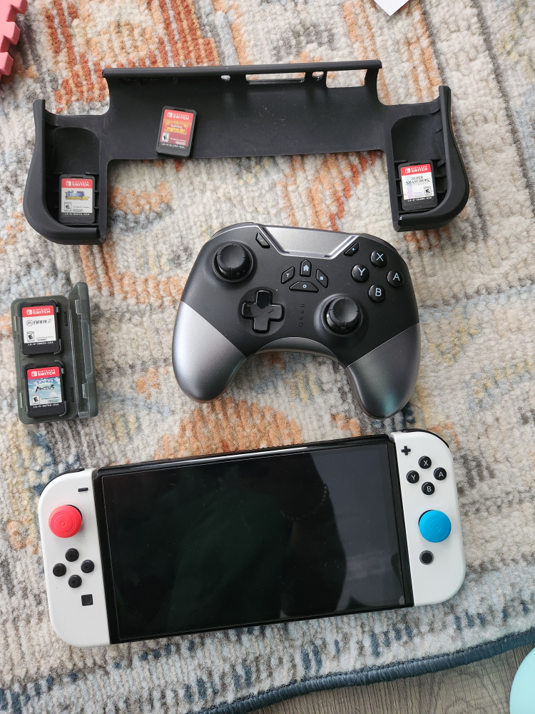 nintendo switch oled with games - photo 2