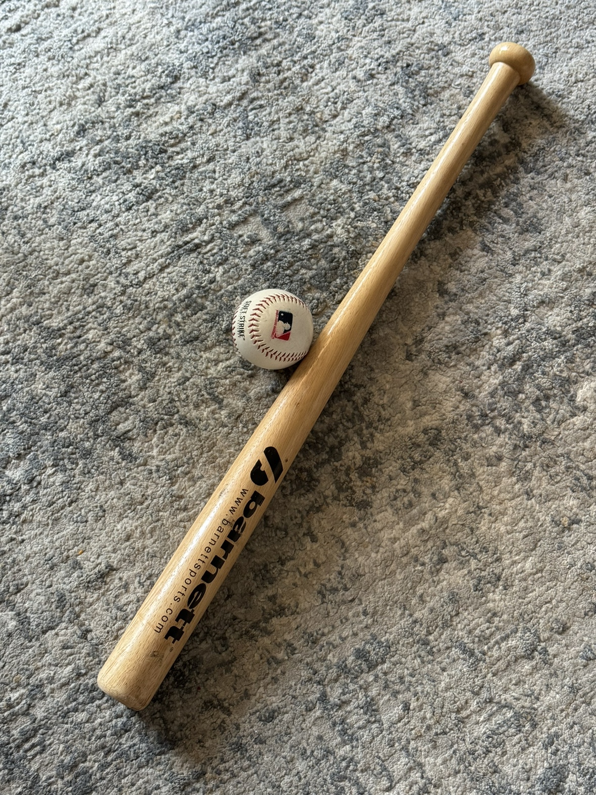 Baseball bat and ball
