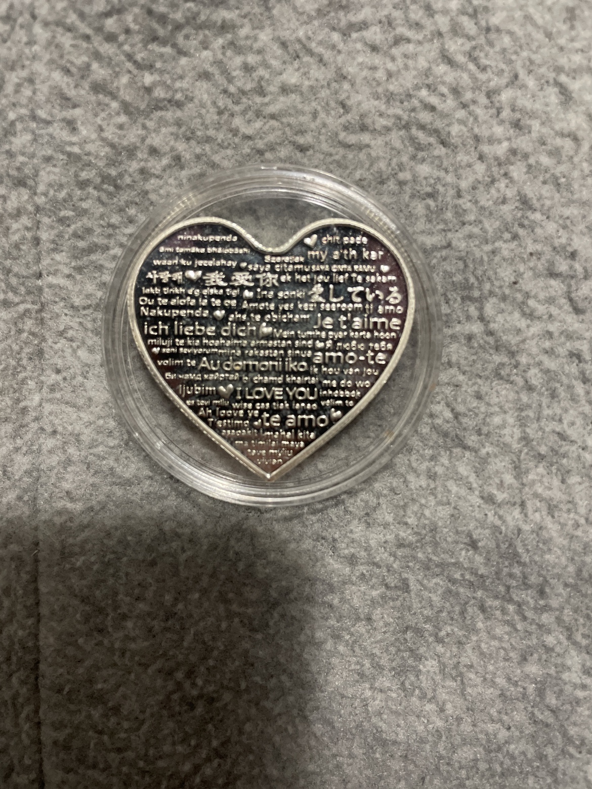 Heart shaped coin with I love you writing in the back image indicator(2)