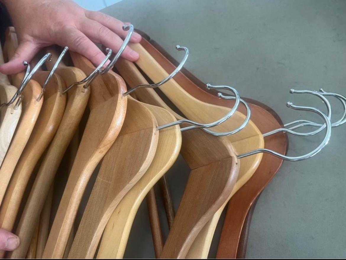 12 sturdy wooden hangers in great condition image indicator(3)