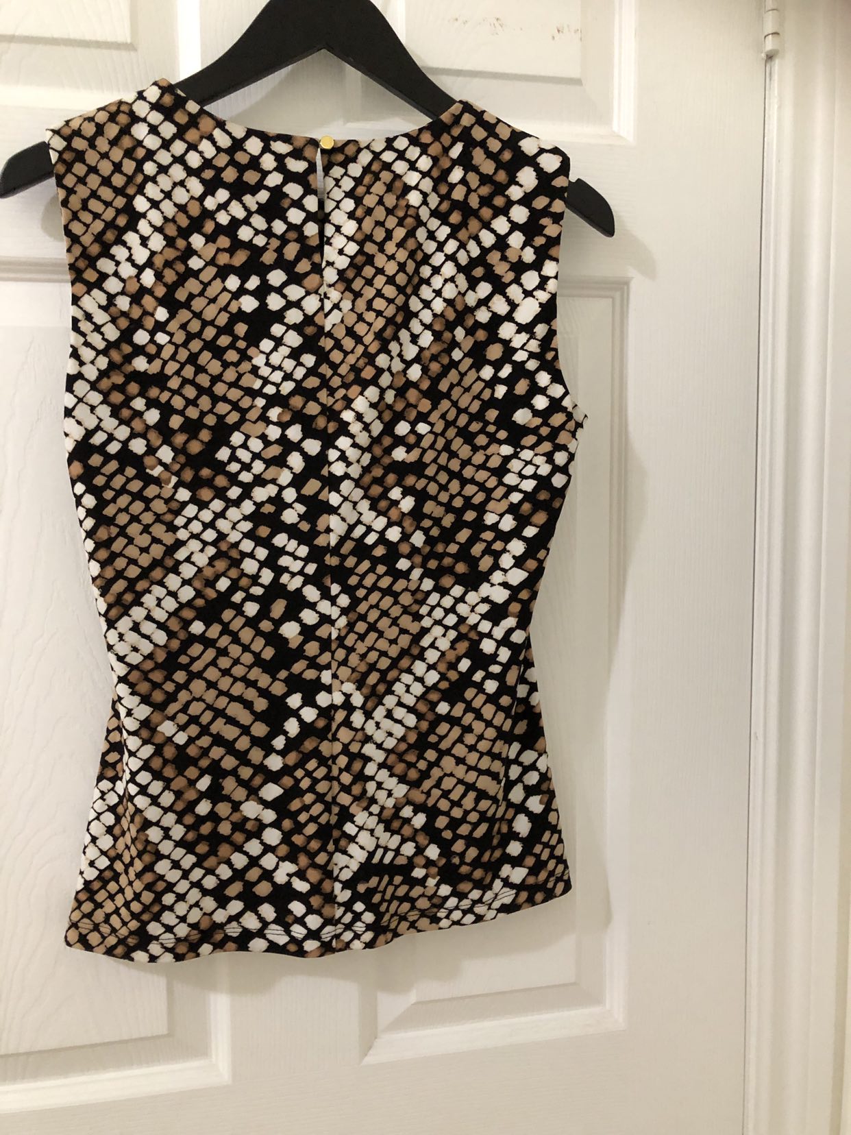 Calvin Klein Printed sleeveless blouse. Orig cost $55.00 image indicator(5)