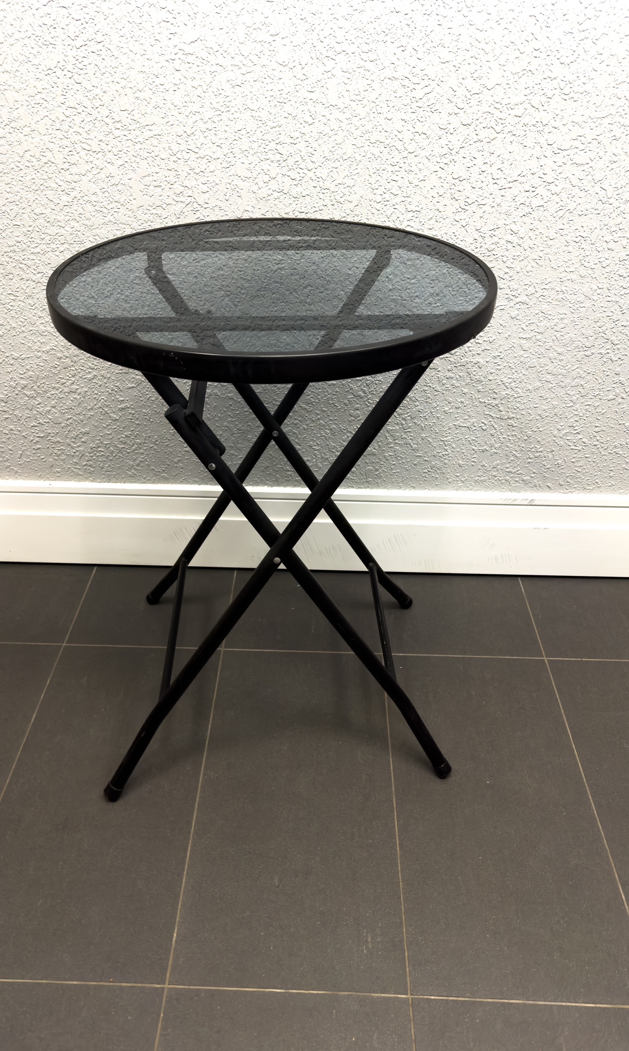 Glass top patio table