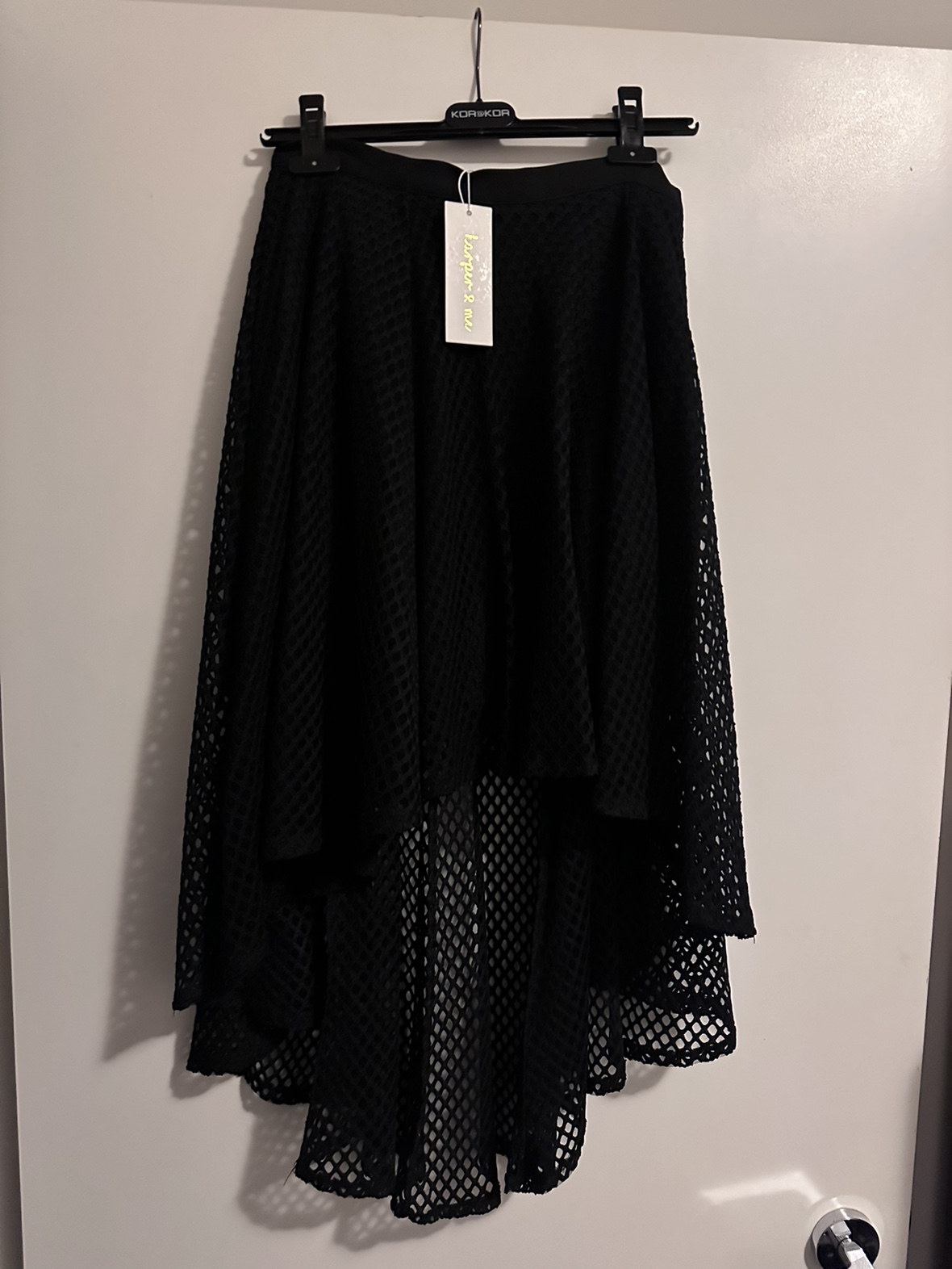 Asymmetrical skirt. Size L. Brand new.