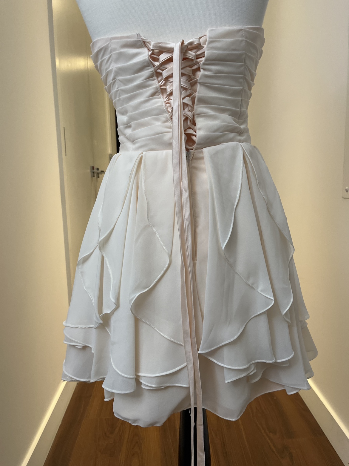 Rose party dress with black bolero and a black bag image indicator(5)