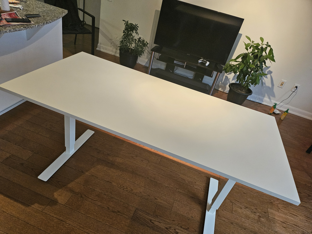 ikea sit and stand table and costco gaming chair