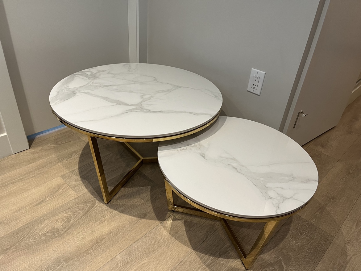 Nesting marble coffee tables with an extra top thumbnail