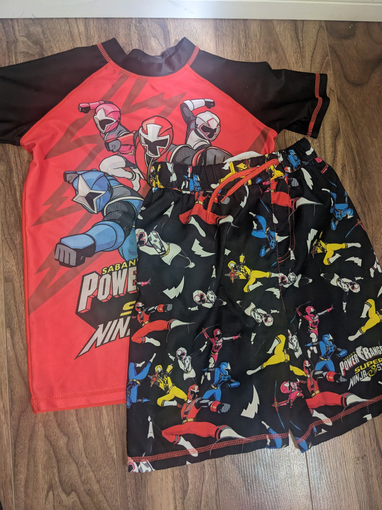 Power Ranger swim trunks and rash guard.