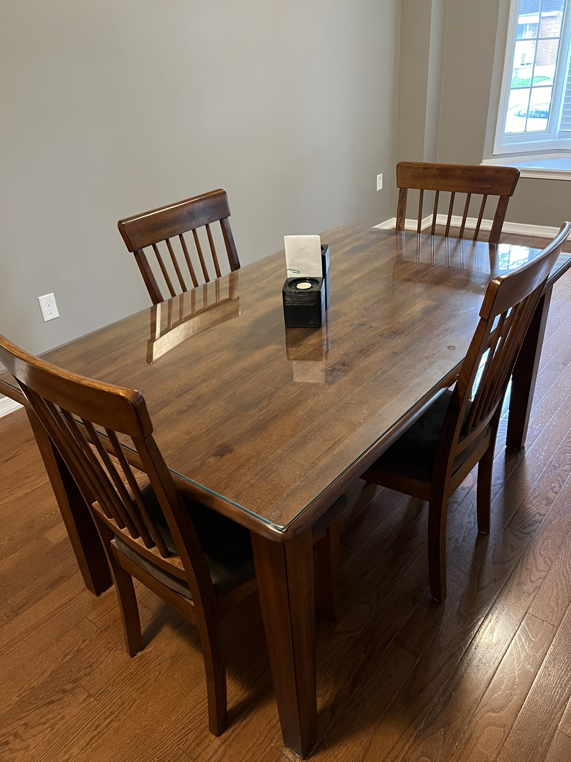 Wood Dining table 4 chairs and glass top protector