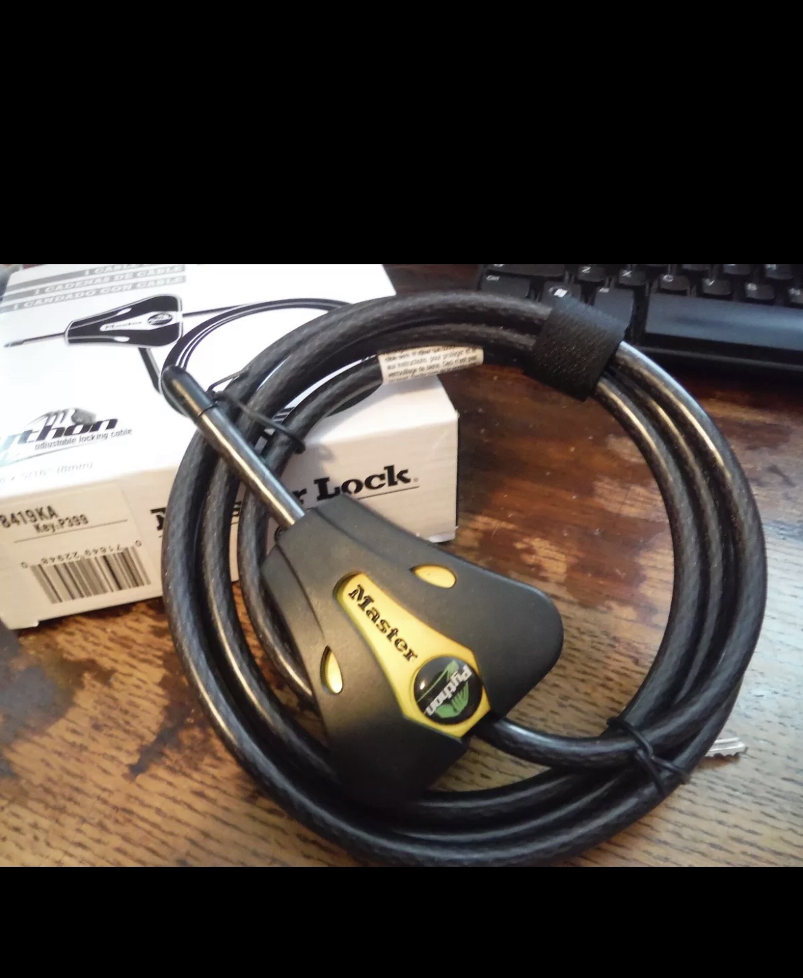 New Master Lock Python Adjustable Locking cable - photo 2