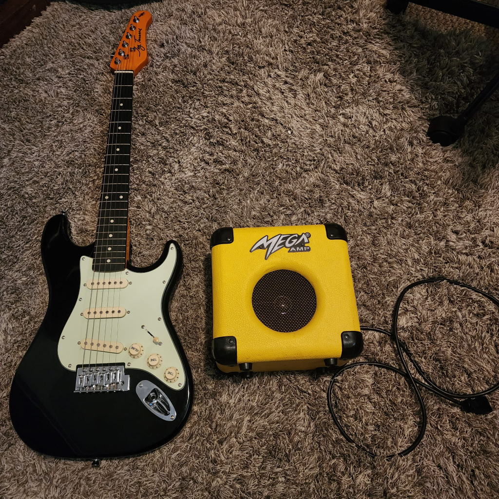 electric guitar jay turser with mega amp