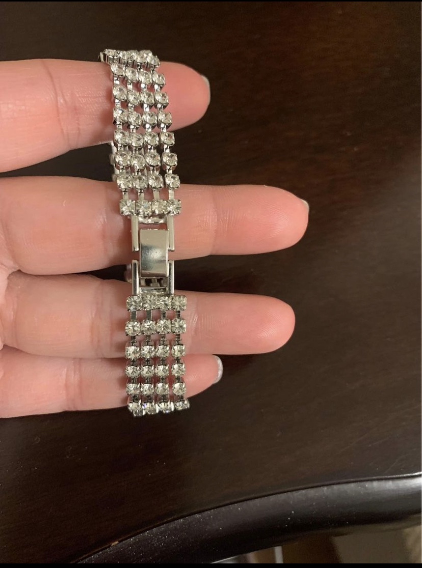 Silver 4 strand clear zirconia tennis bracelet image indicator(3)