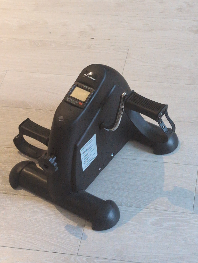 Under desk bike pedal exerciser