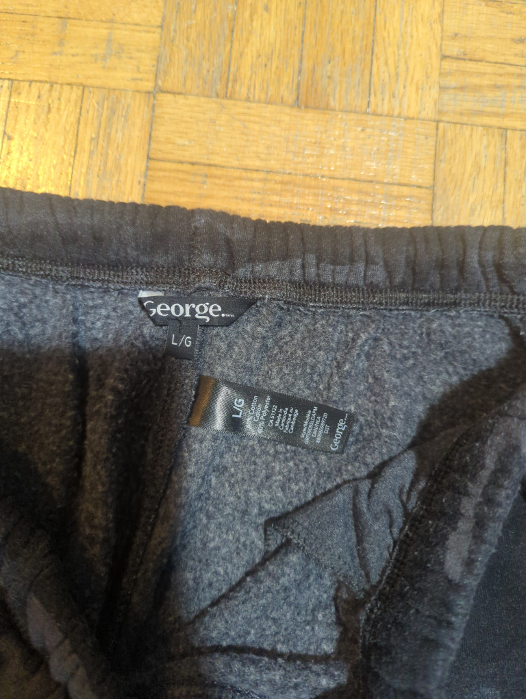 Unisex Black Camouflage track pants image indicator(2)