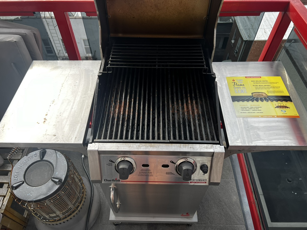 Char-Broil 2-burner grill plus an empty propane tank - photo 2