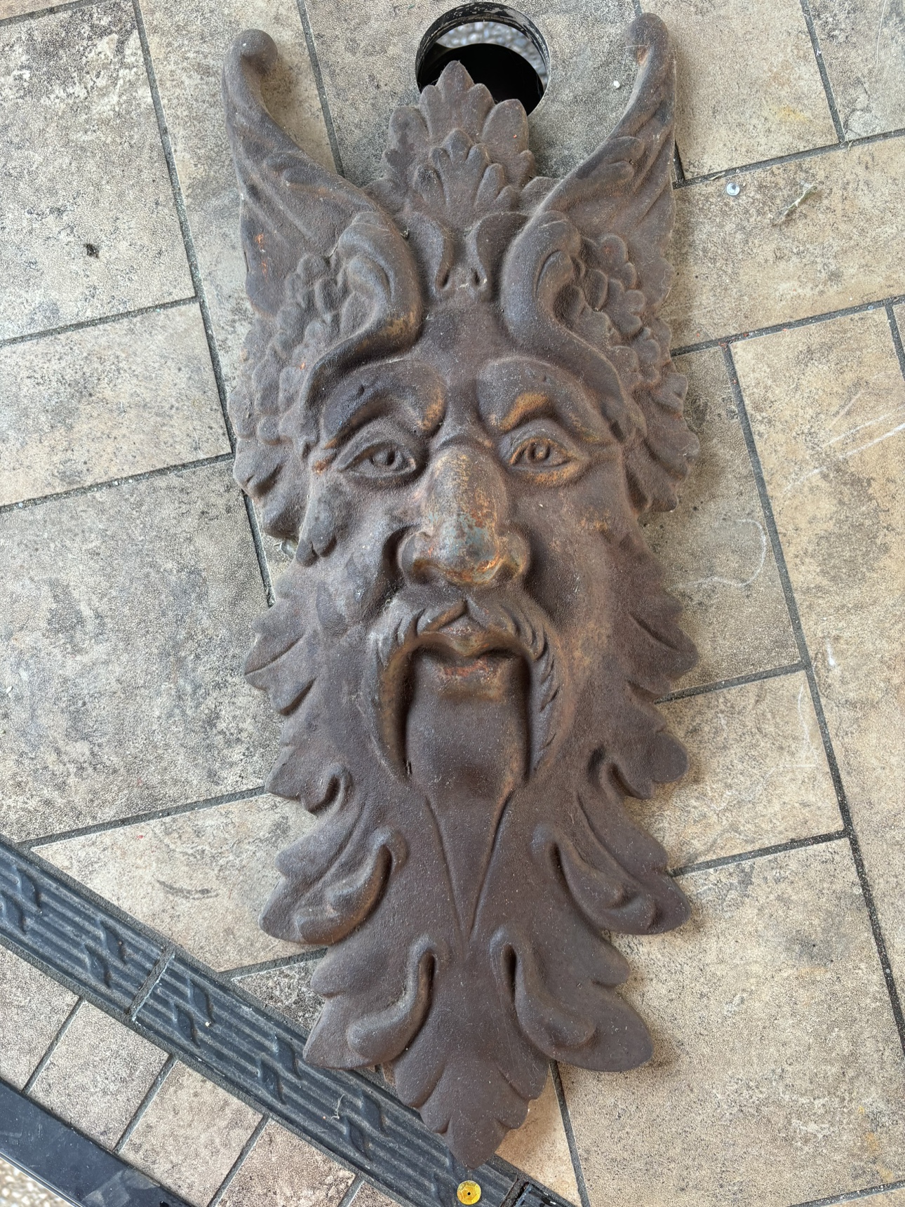 Cast iron green man