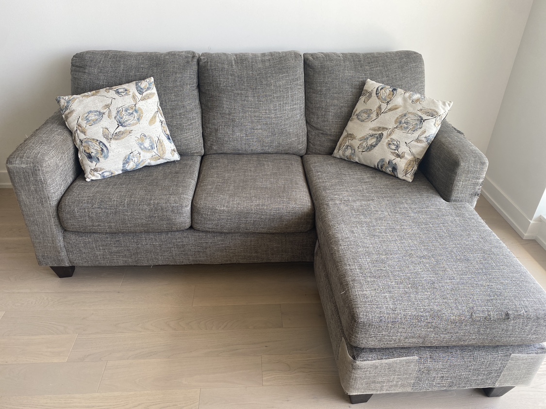 3-person L-shaped grey couch with matching cushions - photo 4