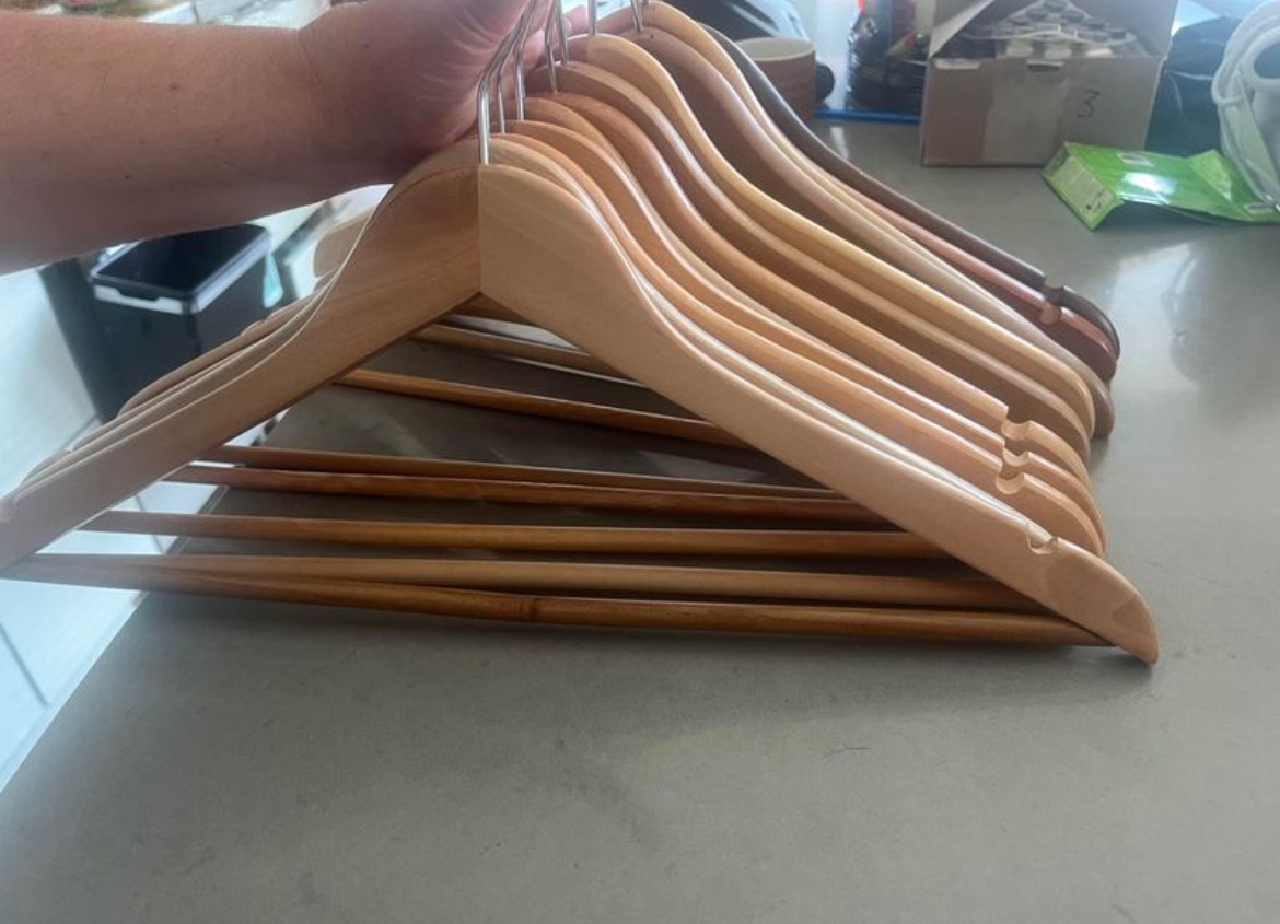 12 sturdy wooden hangers in great condition image indicator(2)