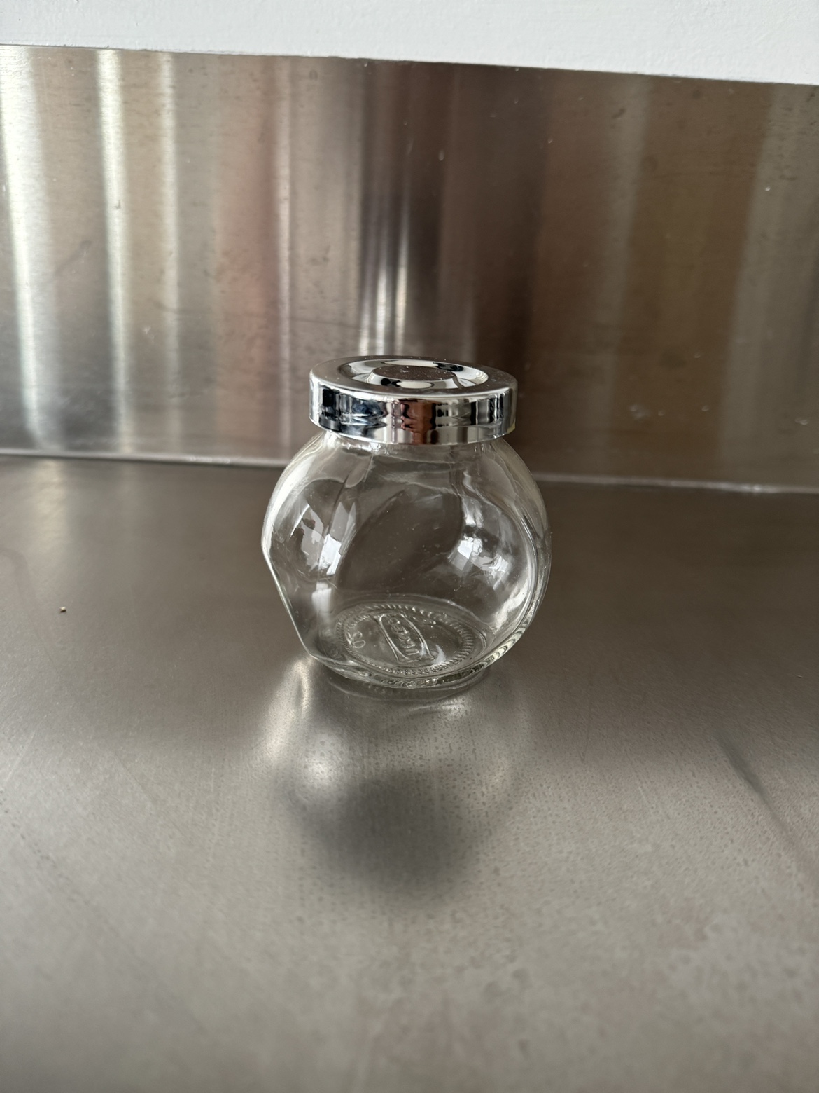 Small glass storage container