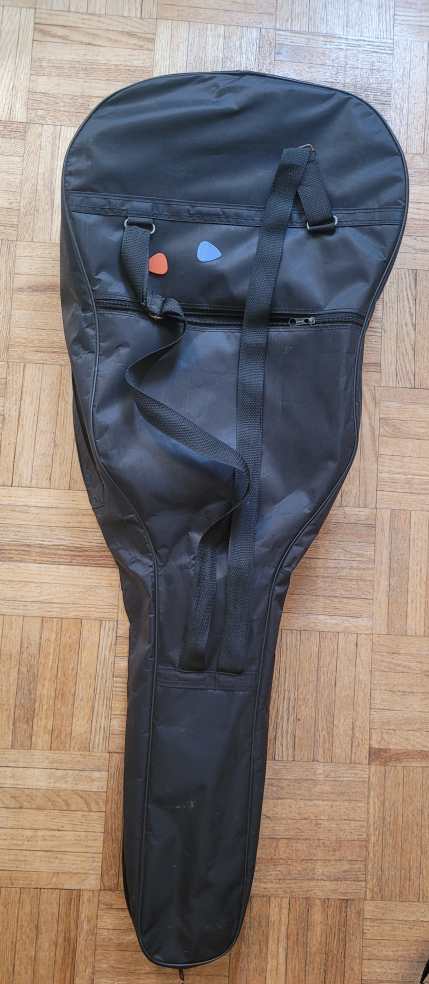 Guitar with Protective Cover and Two Picks image indicator(2)