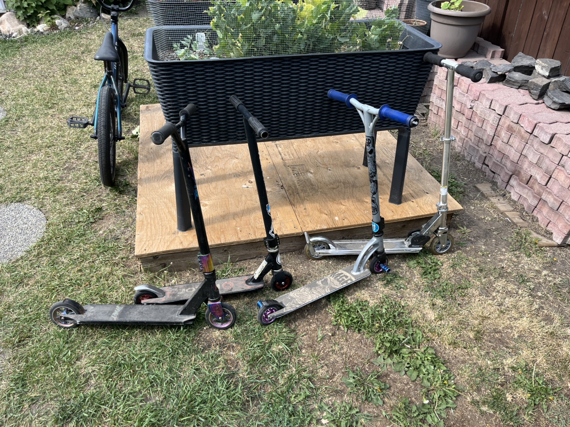4 push scooters $20 obo for all