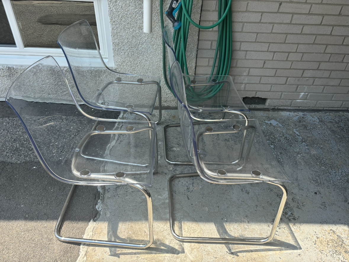 Four acrylic chairs image indicator(3)