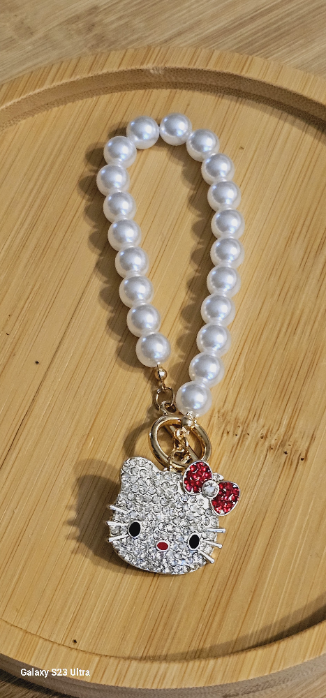 1 hello kitty hair clip and 1 hello kitty bracelet  #freecycle image indicator(2)