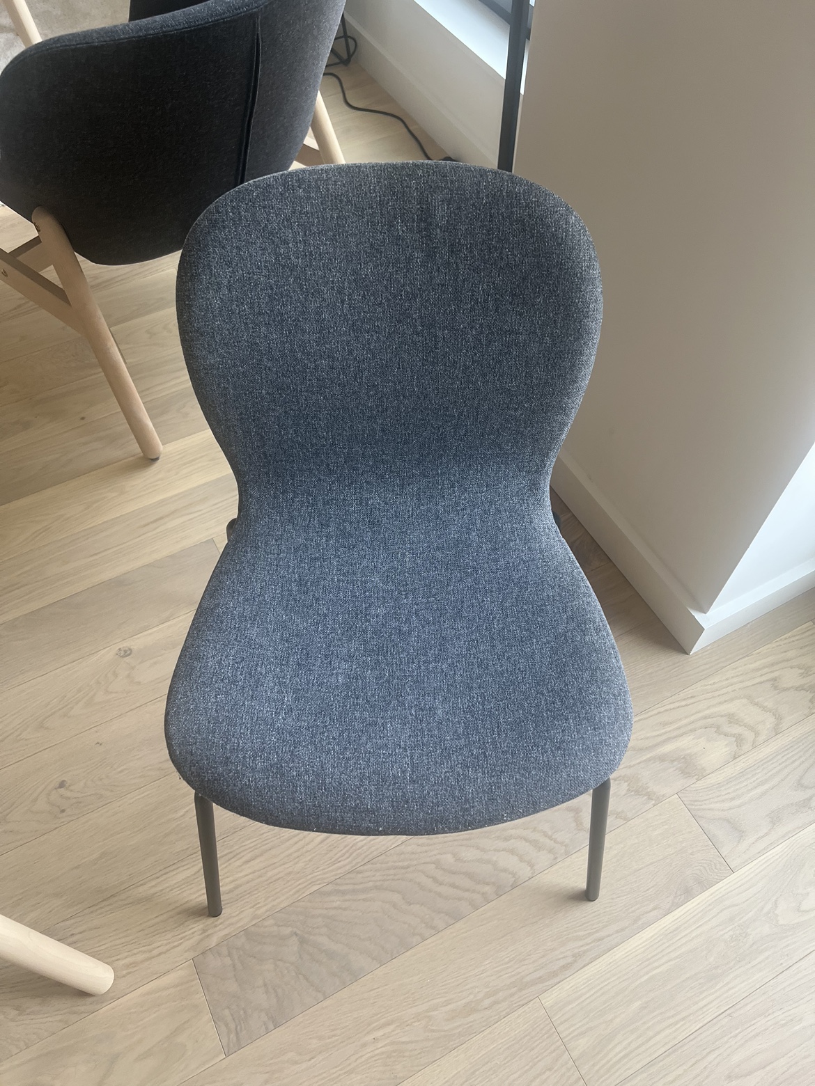 4 dark gray chairs