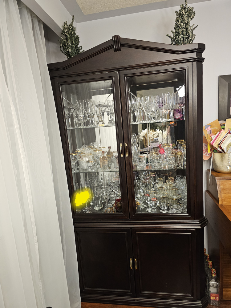 full cabinet with drawers and built in lighting