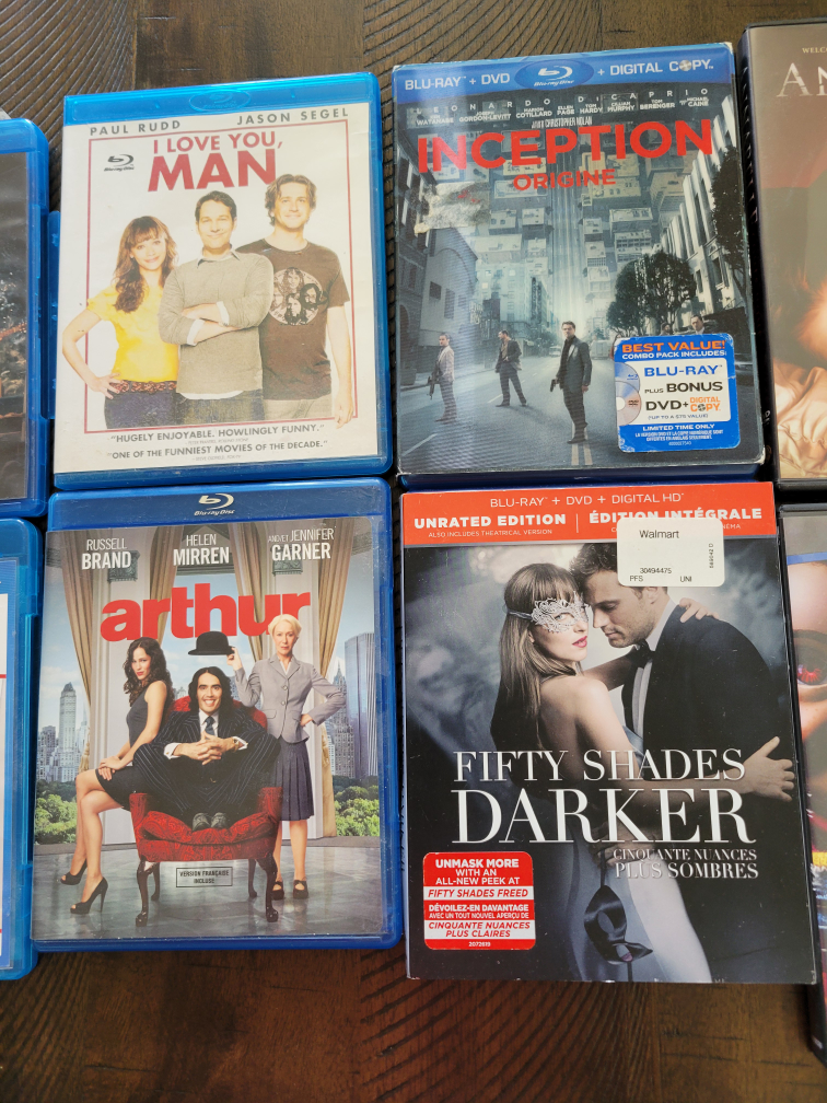 Assorted Blu-Rays and DVDs image indicator(3)