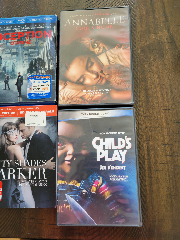 Assorted Blu-Rays and DVDs image indicator(4)