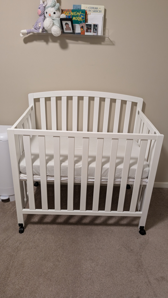 West Coast Kids mini crib in excellent condition.