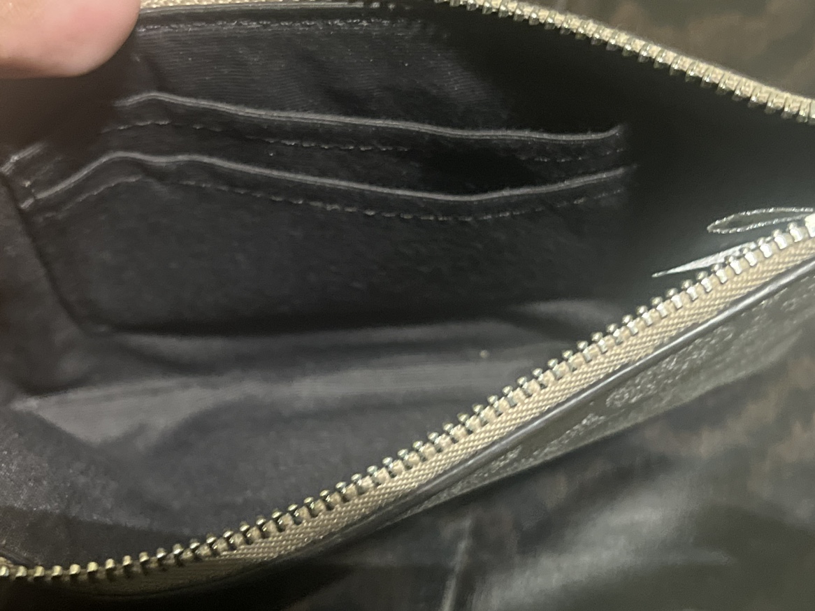 Coach metallic gold and silver wristlet image indicator(3)