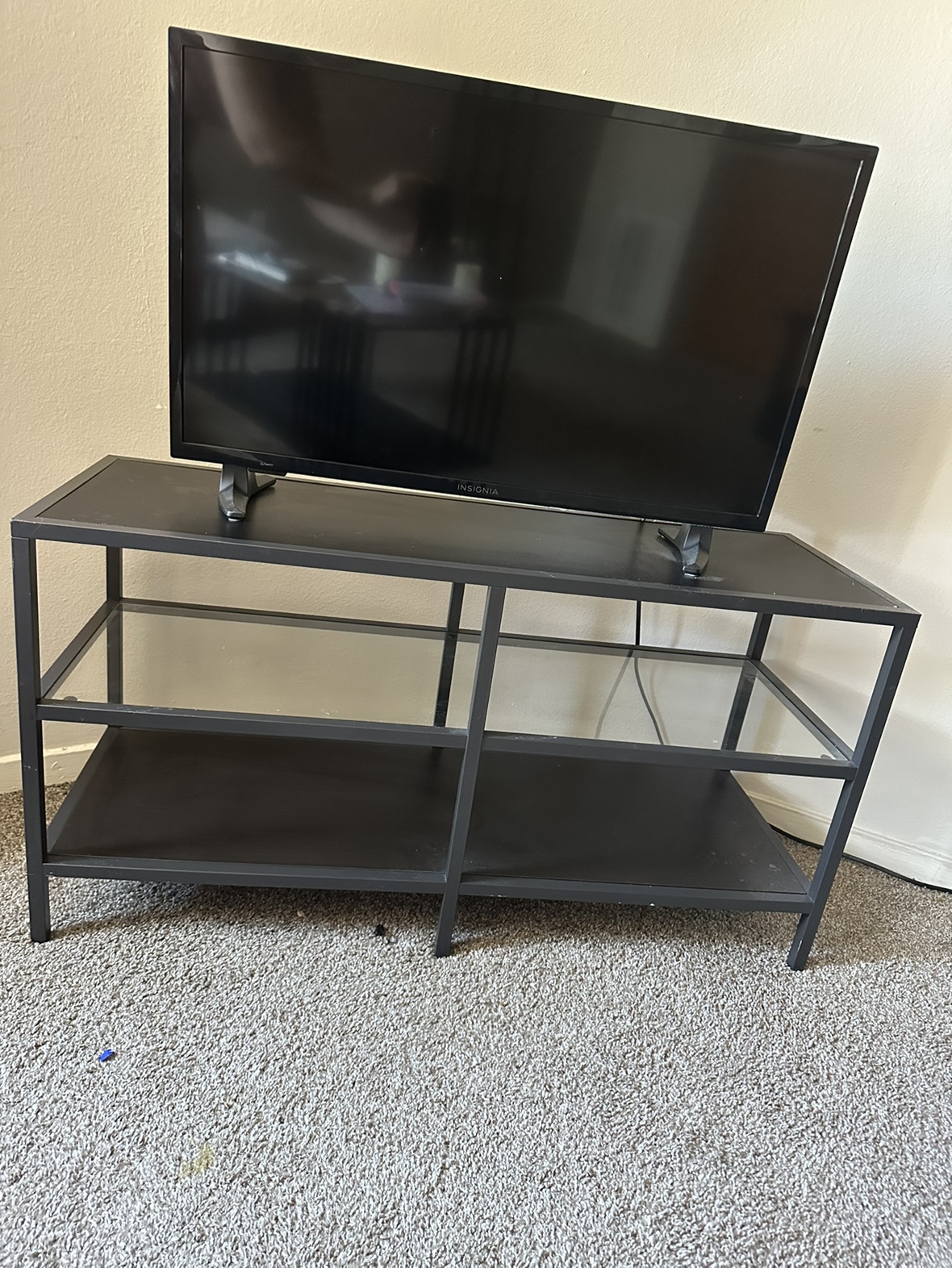 Black metal TV stand