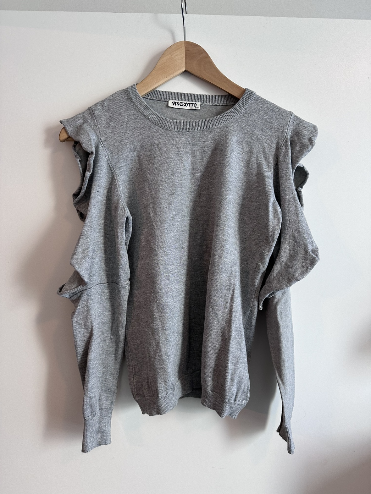 Light crew top. Size M. Shoulder slits.