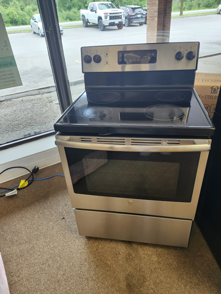 Used GE glass top electric range  in good condition - photo 4