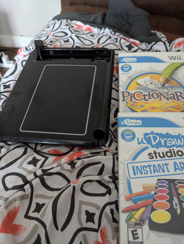 wii tablet and 2 games