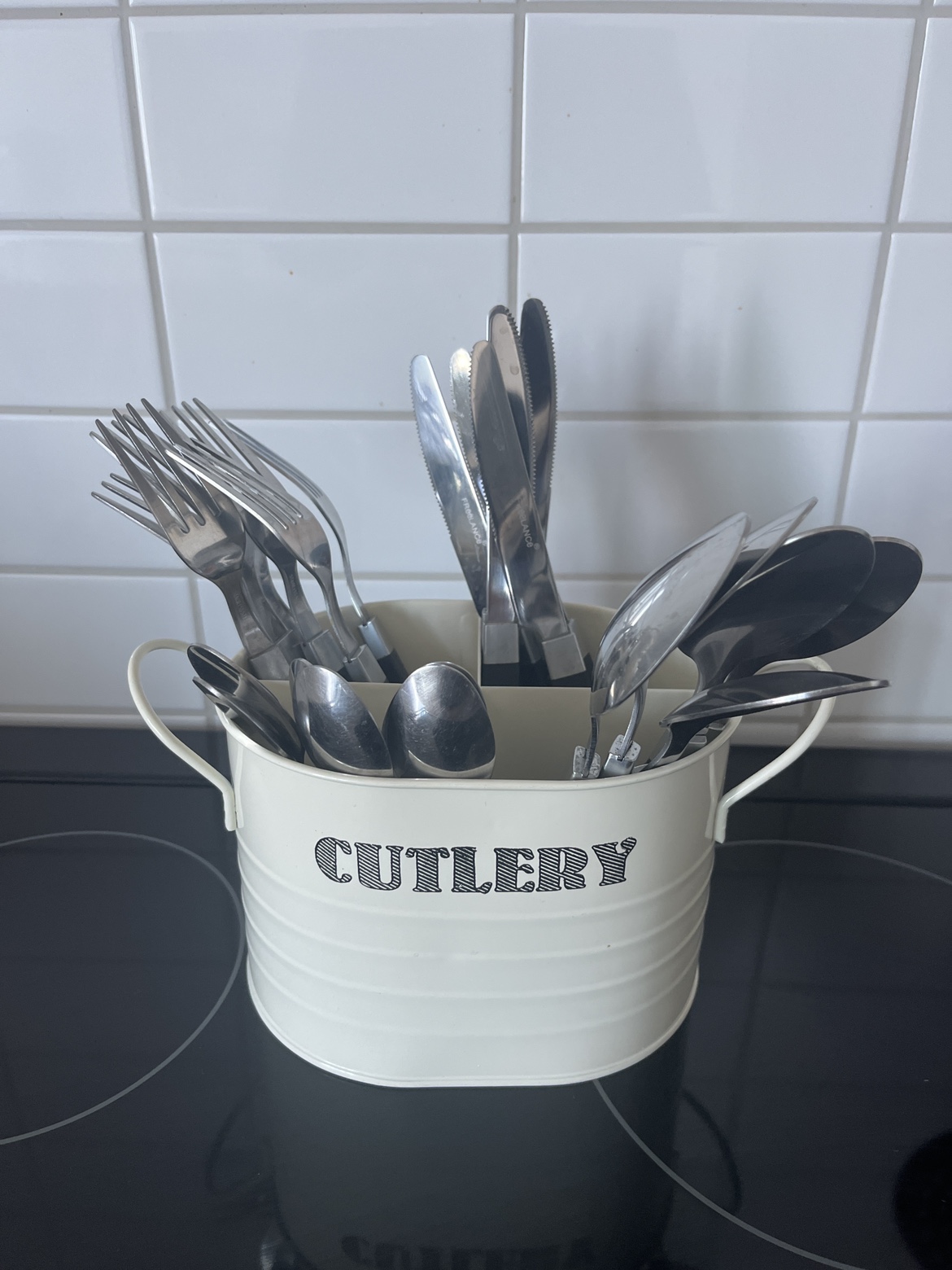 Cutlery set with holder