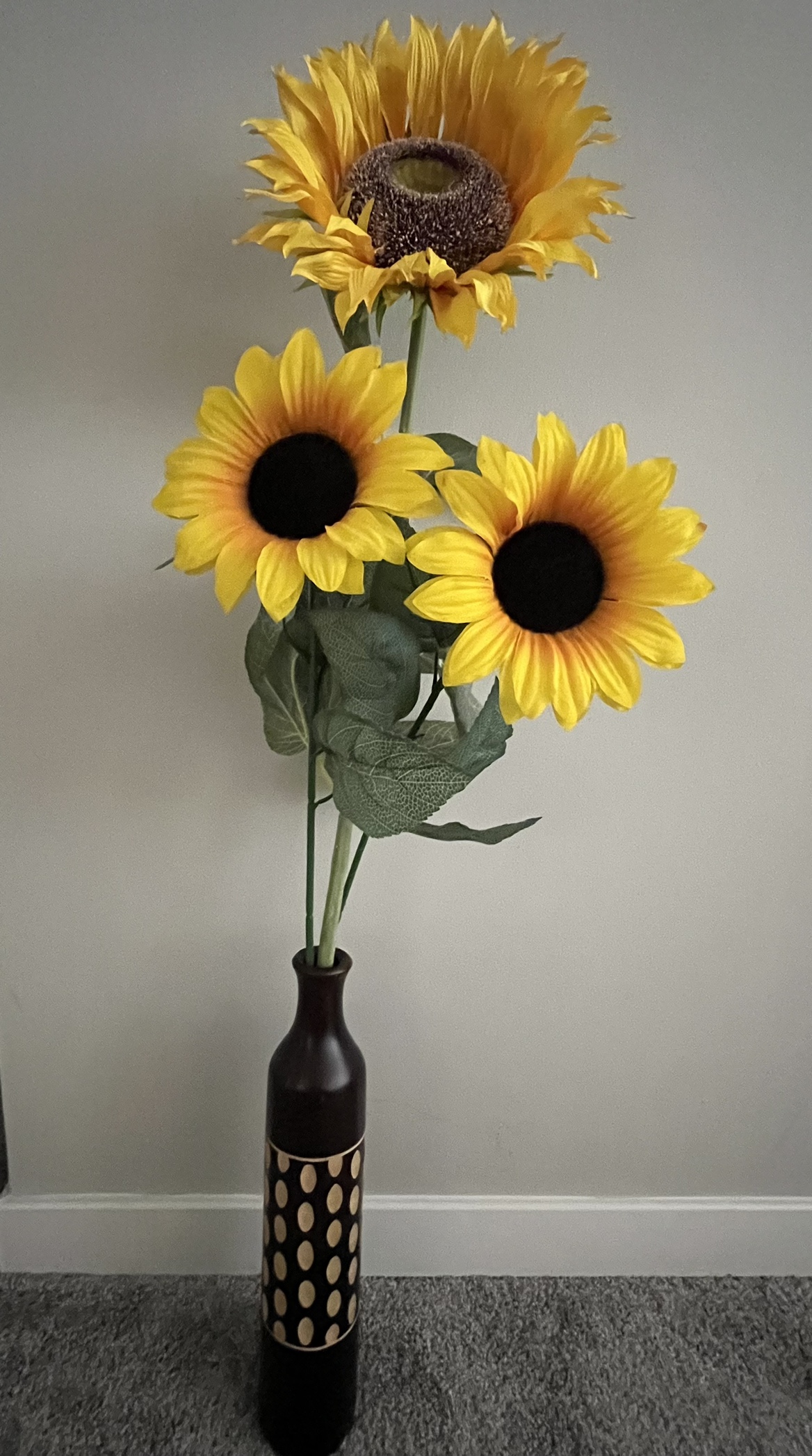Artificial sunflowers with vase