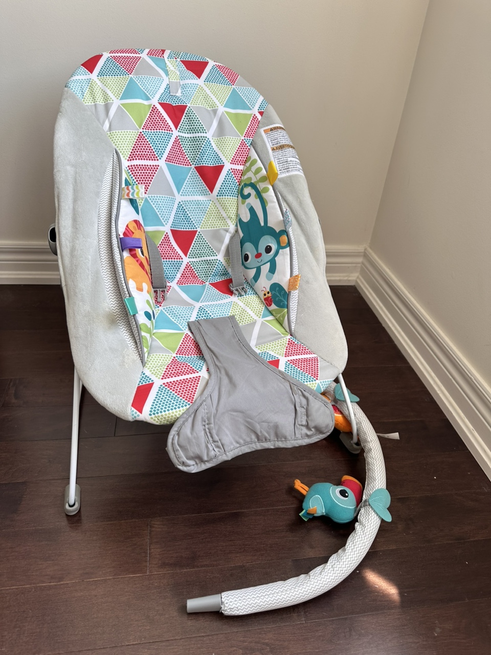 Baby bouncer with toy bar