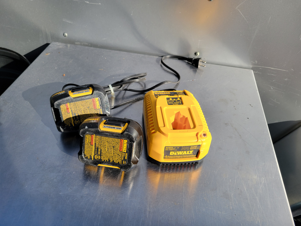 Dewalt 18v charger and 2 batteries. thumbnail