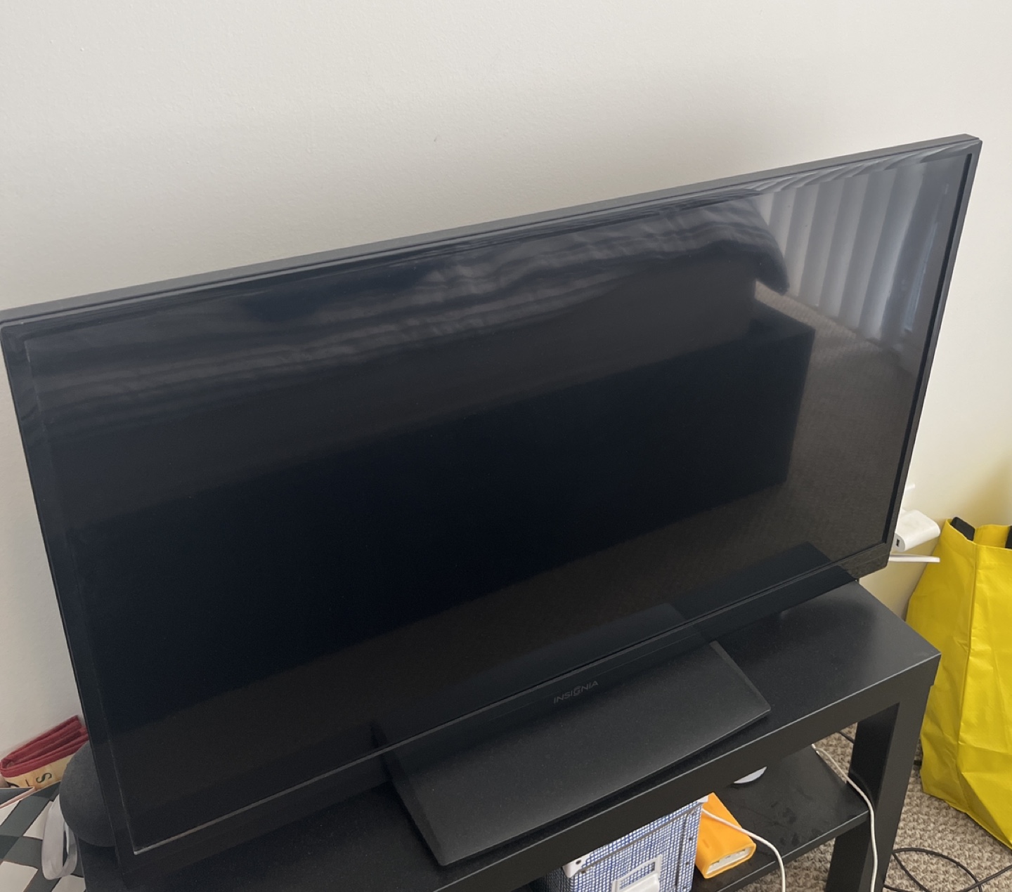 Insignia TV with stand